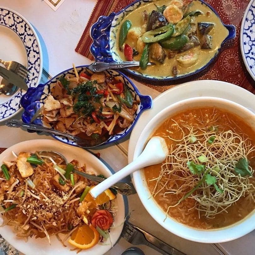 A full table of Thai dishes